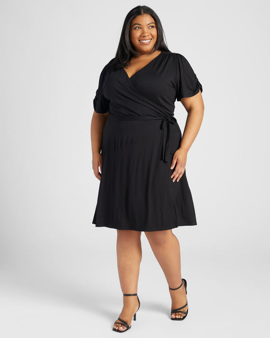 Solid Short Sleeve Wrap Dress Black $|& Loveappella Solid Short Sleeve Wrap Dress - SOF Front