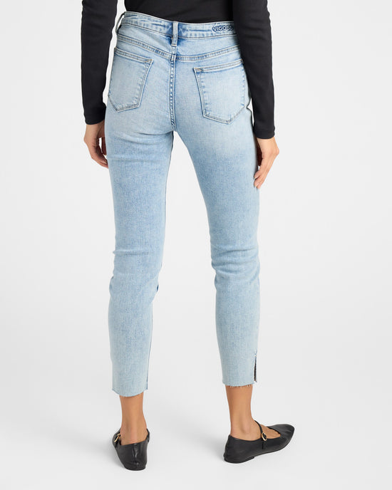 Light Wash Blue $|& Vigoss Ace Skinny Jeans with Side Slit - SOF Back