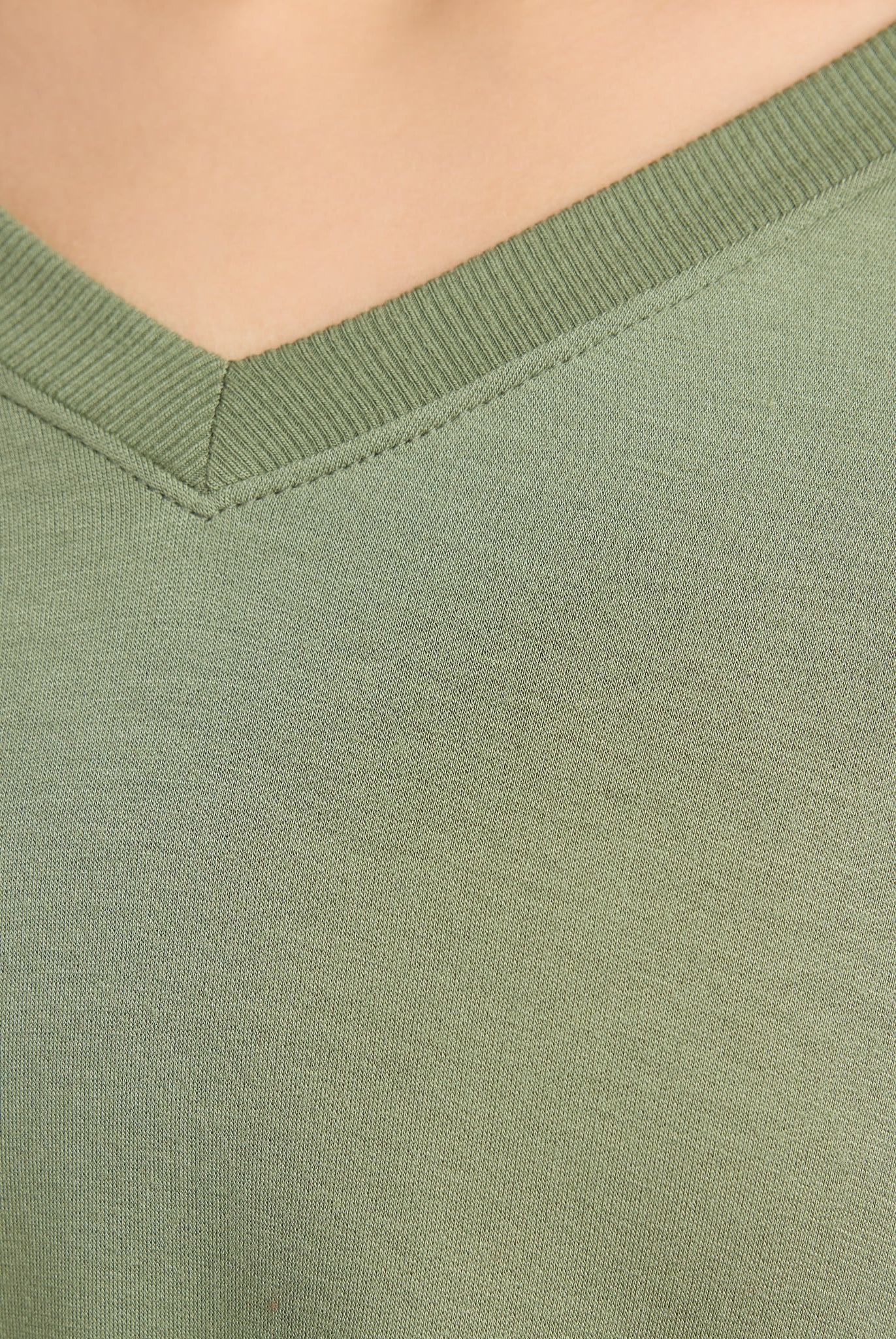 Four Leaf Clover $|& Interval Flex Fleece V-Neck Top - SOF Detail