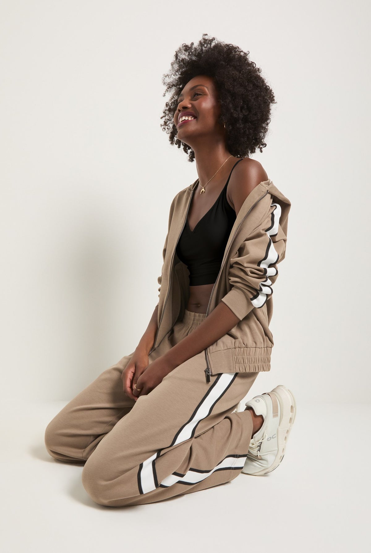 Sand Stone $|& Interval Warm Up Hooded Jacket - VOF Front