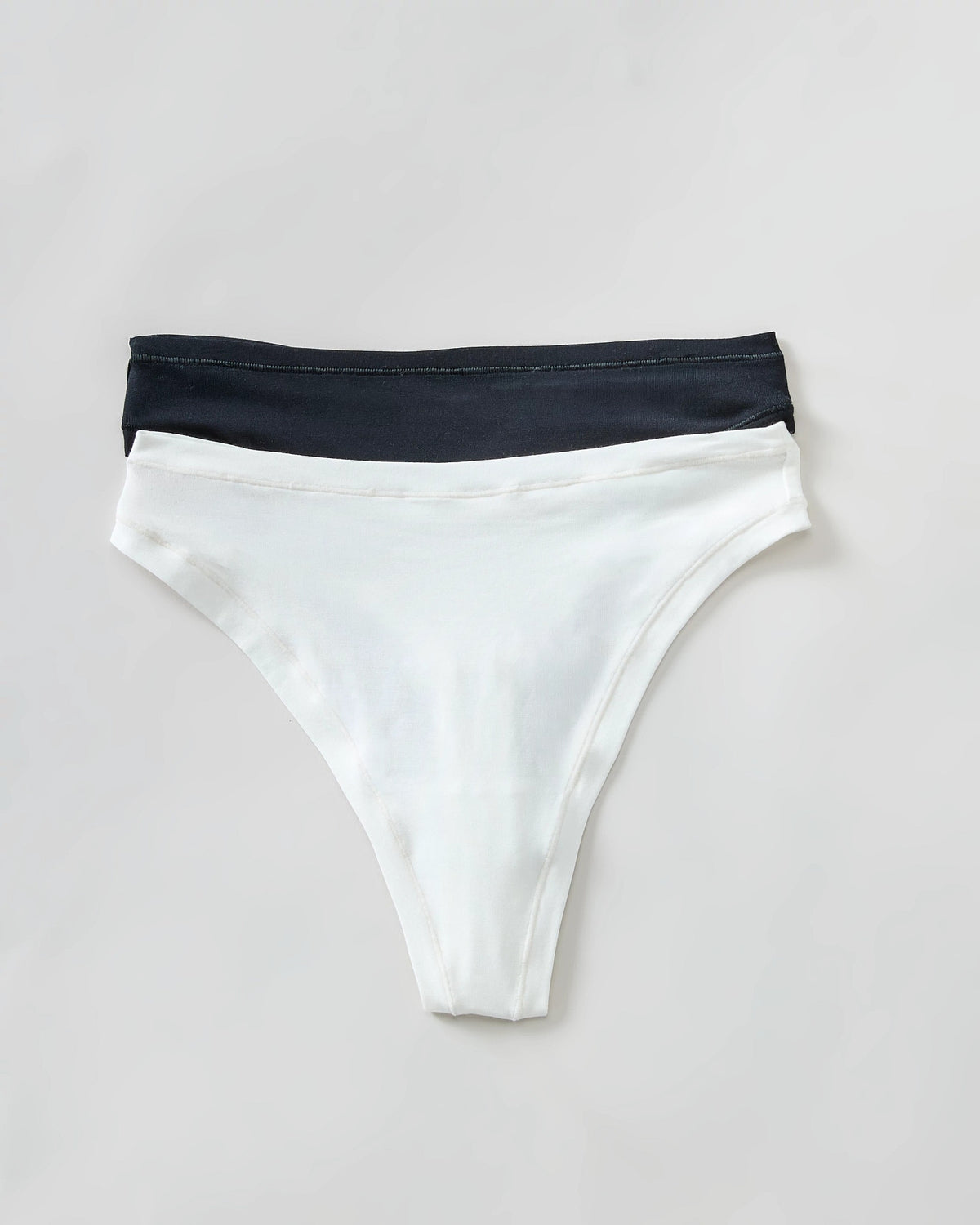 Ivory/Black $|& Montelle Bodybliss Thong 2 Pack - Hanger Detail