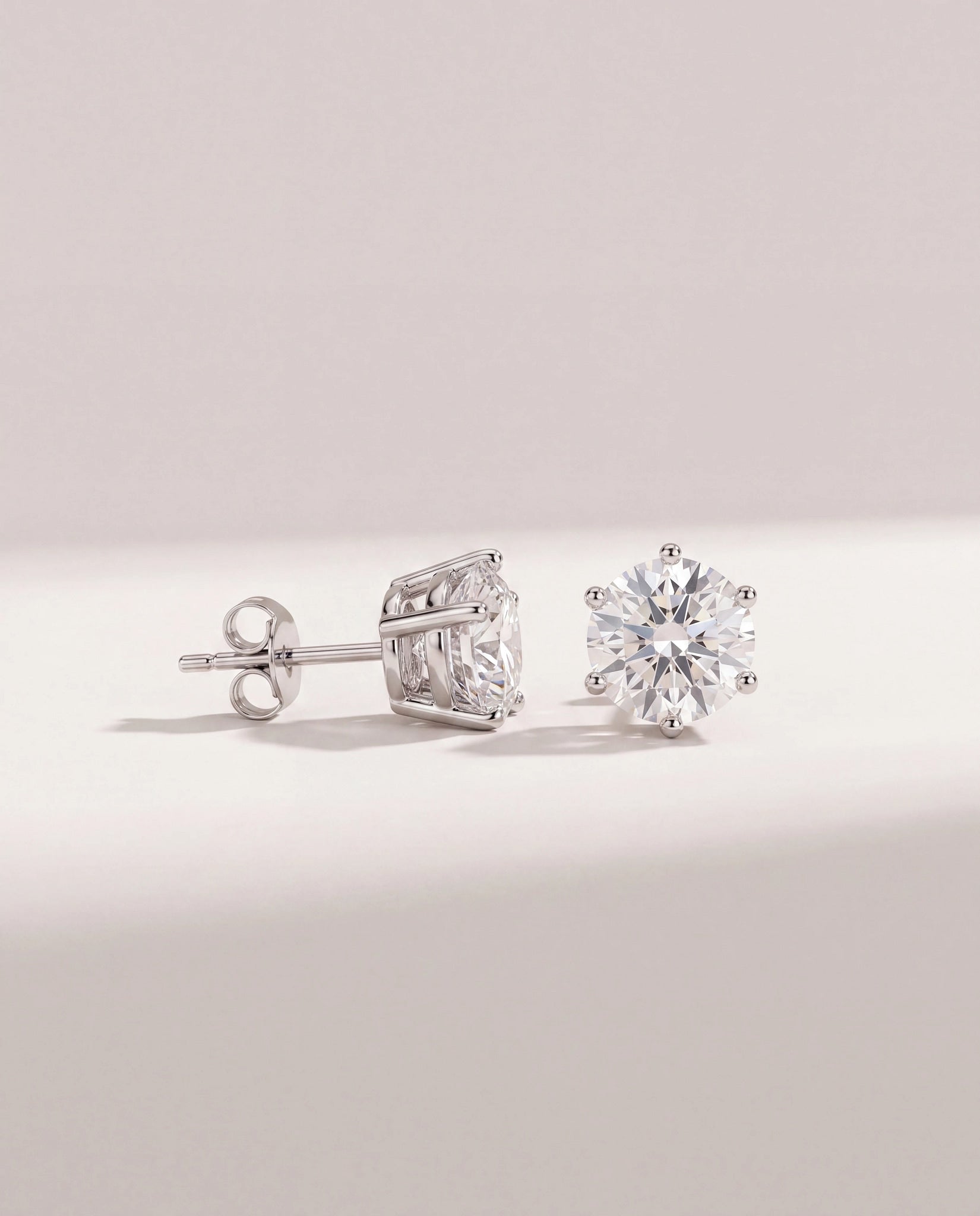 Platinum $|& SEAS Round Stud Earrings - VOF Front