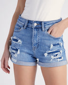 Medium Wash $|& Vervet Mid Rise Patched Short - SOF Detail
