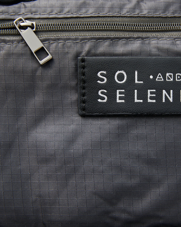 Black $|& Sol and Selene Inspiration Crossbody - Hanger Detail
