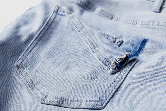 Light Wash $|& Risen Jeans High Rise Distressed Boyfriend Jean - Hanger Detail