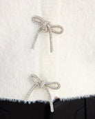 Ivory $|& Sadie & Sage Porcelain Cardigan with Rhinestone Bows - SOF Detail