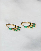 14k Gold $|& Native Gem Floating Emerald Huggies - VOF Front