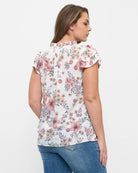 White Floral $|& West Kei Floral Woven Flutter Sleeve Top - Hanger Side