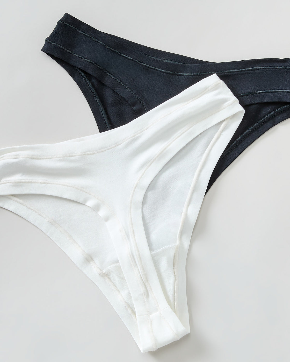 Ivory/Black $|& Montelle Bodybliss Thong 2 Pack